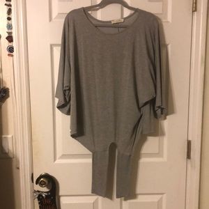 Gray batwing style top with tie bottom.